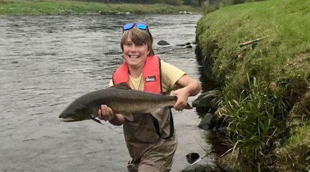 Happy-young-angler-e1630257566359-620x344