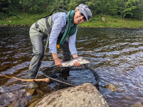 Jill Elkington with a wee grilse.