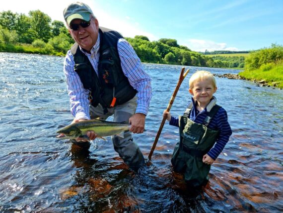 What a cracking photo! Jan and Joe with a sparkling grilse.