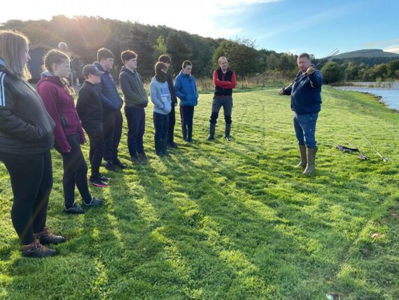 Ian Gordon giving the pupils a talk about rods and casting on the first morning.