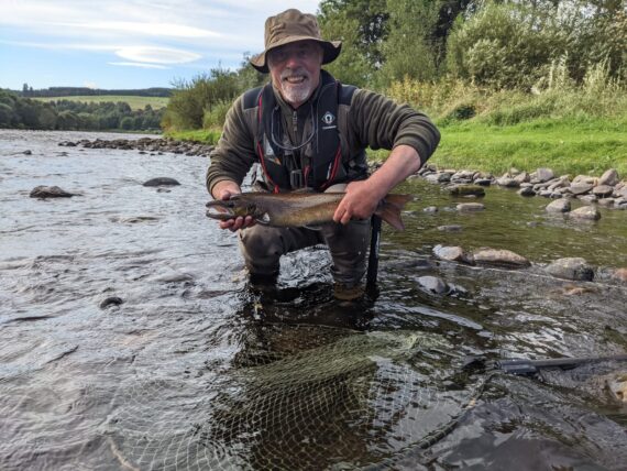 Mark Jones with a baby croc in the Cobble Pot