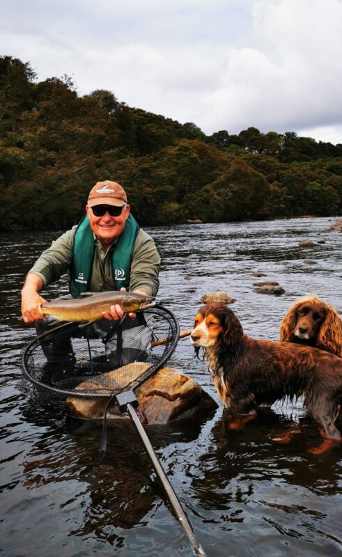 Sam Elkington with a bonny fish and the Delfur โghilliesโ