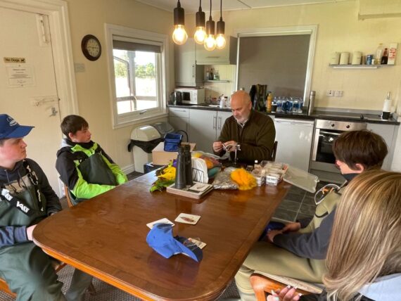 The author demonstrating Flytying with one of the groups of pupils