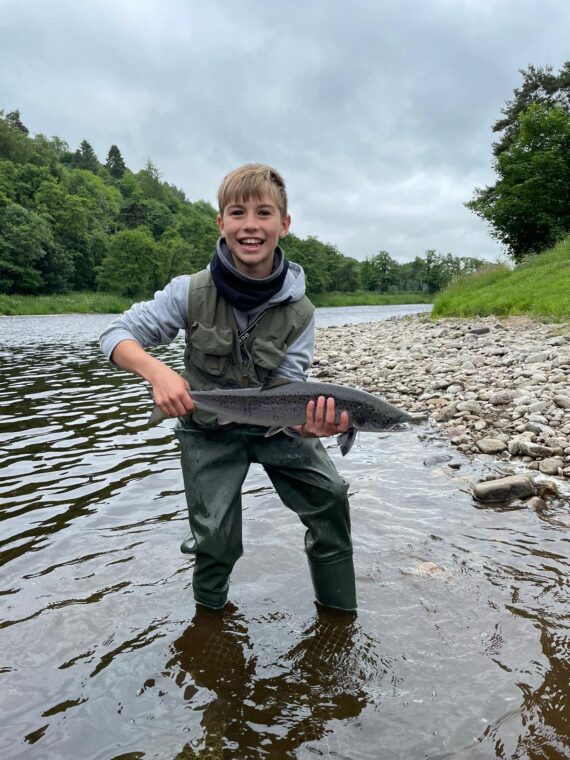 Young James Robertson with a nice grilse to his own rod.